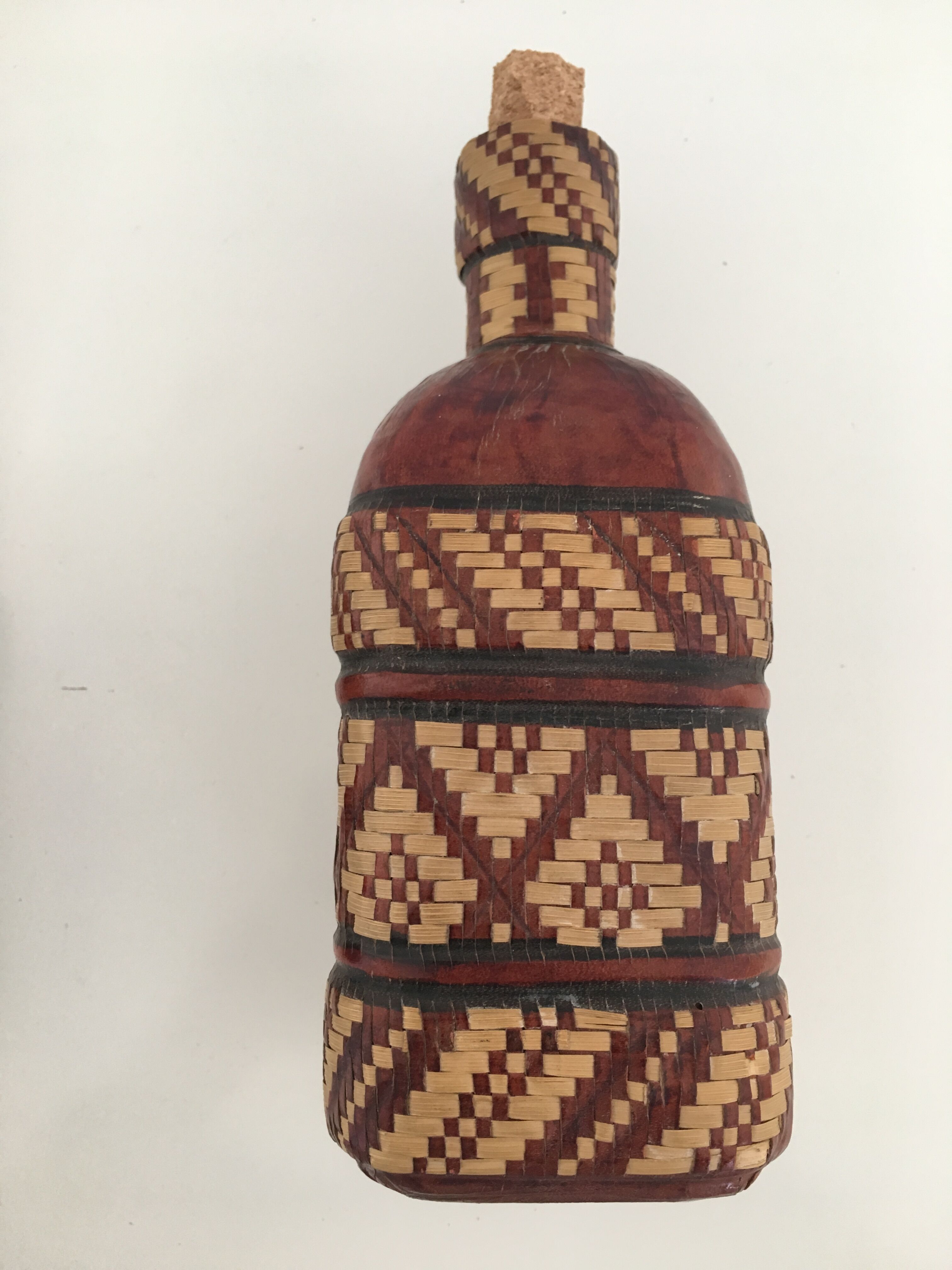 Lot of 2 ethnic leather-wrapped bottles and box