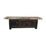 Former 1930 carpenter's workbench has black patinated doors and drawers
