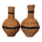 Set of two woven baskets-jars made from natural fibres.