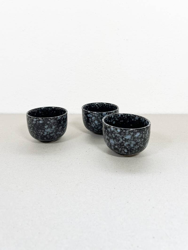 Black and gray ceramic mugs