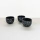 Black and gray ceramic mugs