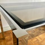 Glass and chrome metal dining table