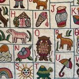 Vintage alphabet wall rug