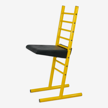 Adjustable seat chair. Circa 1980. Italy. Yellow lacquered steel.