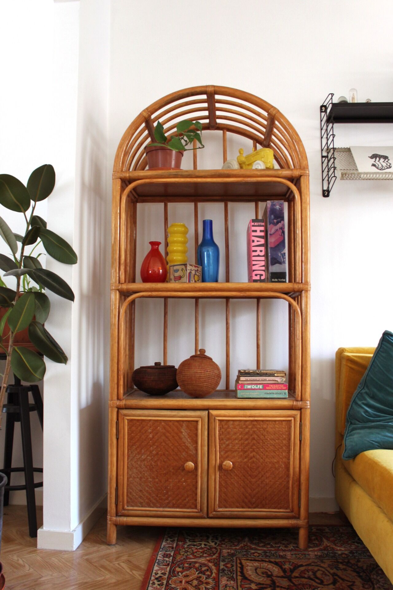 Woven rattan and bent bamboo arched bookcase display high wall cabinet.