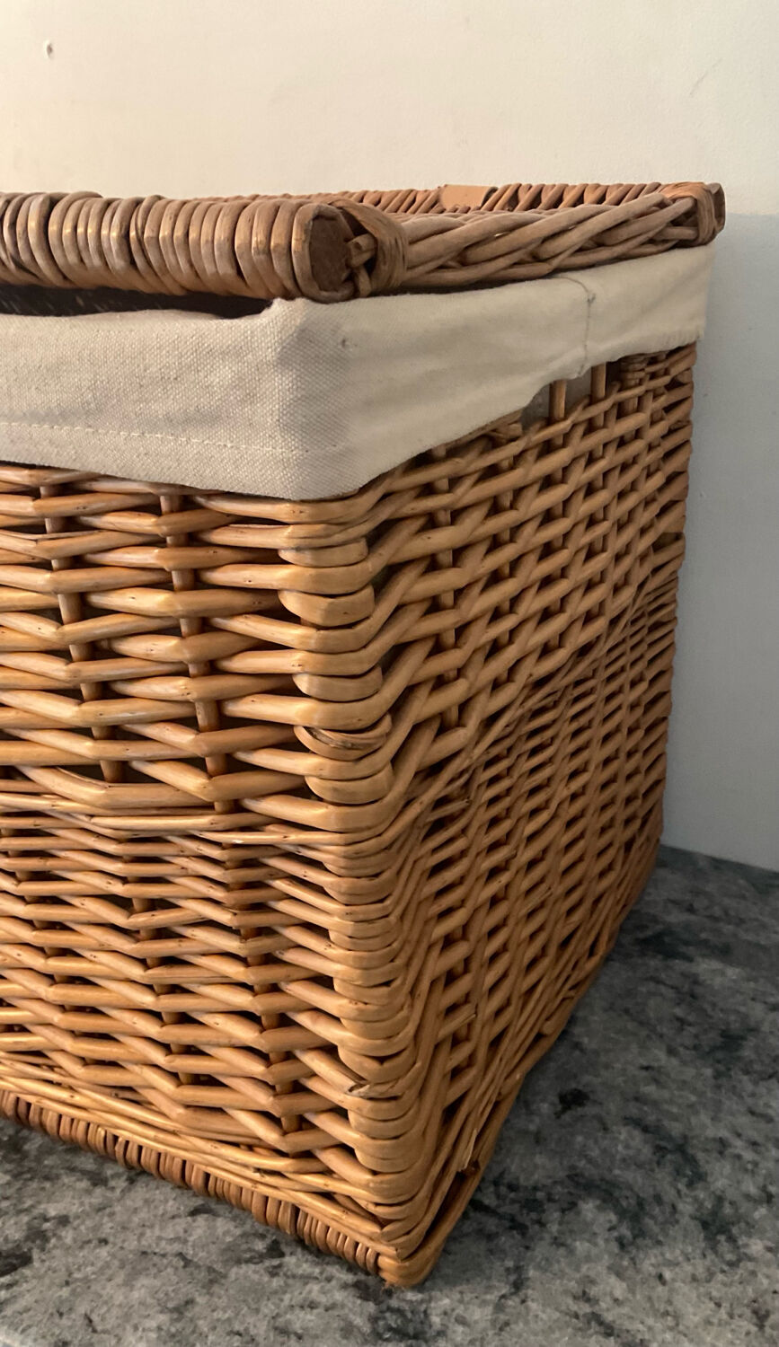 Woven wicker vintage suitcase