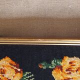 Golden frame with ancient canvas of yellow roses