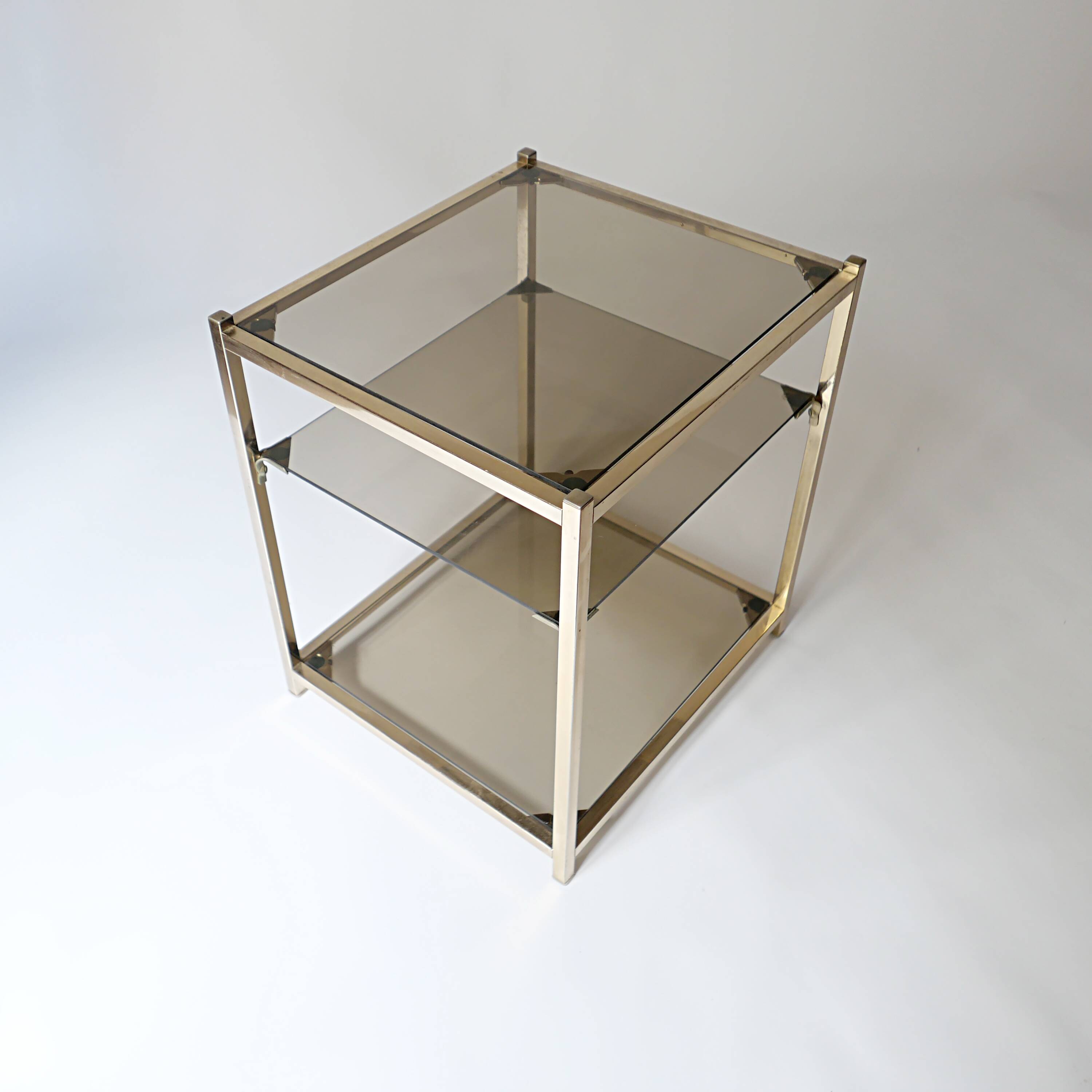 vintage coffee table design 1960s 1970s in gold metal and smoked glass