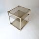 vintage coffee table design 1960s 1970s in gold metal and smoked glass