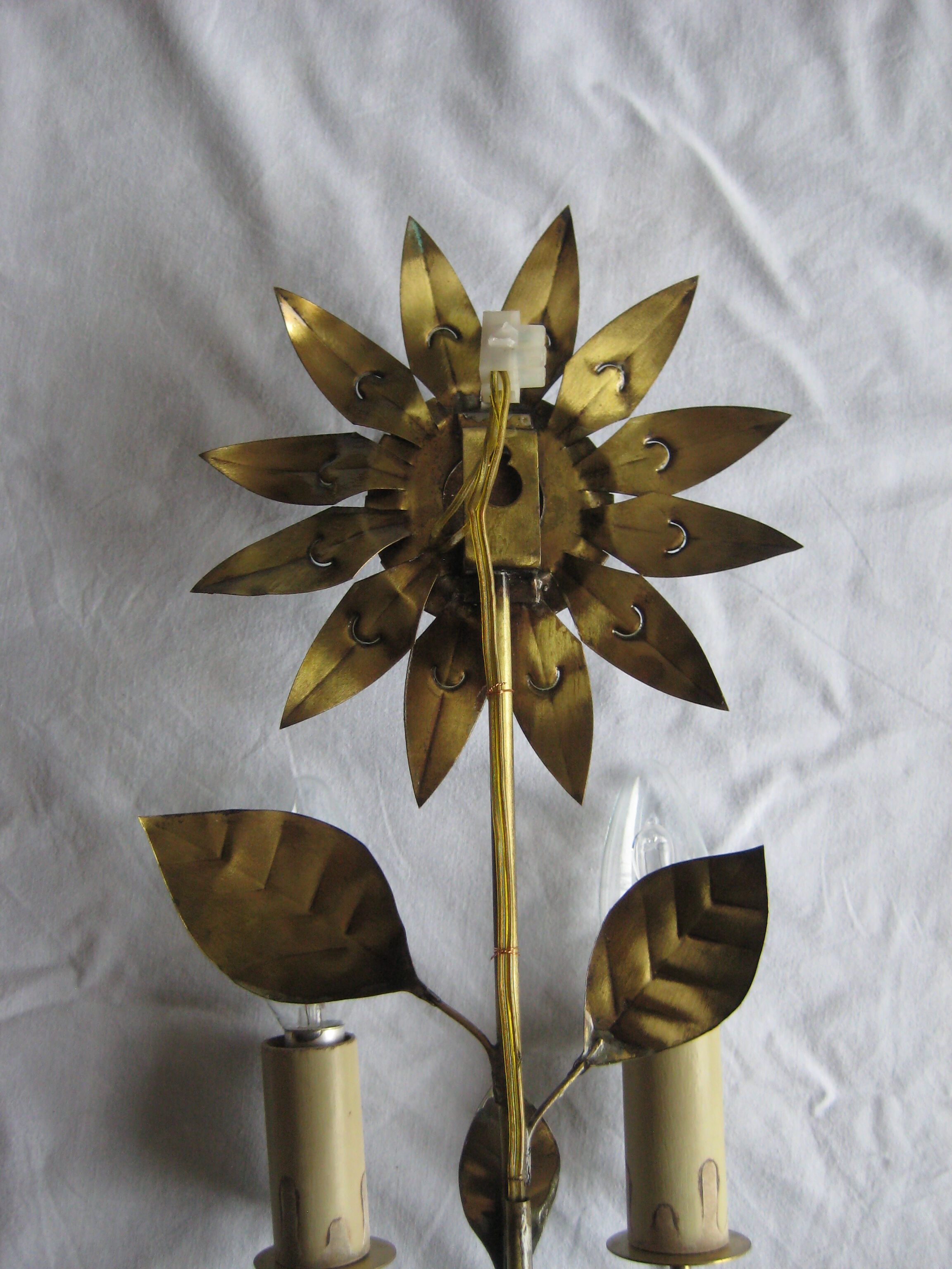 Brass sunflower sconces
