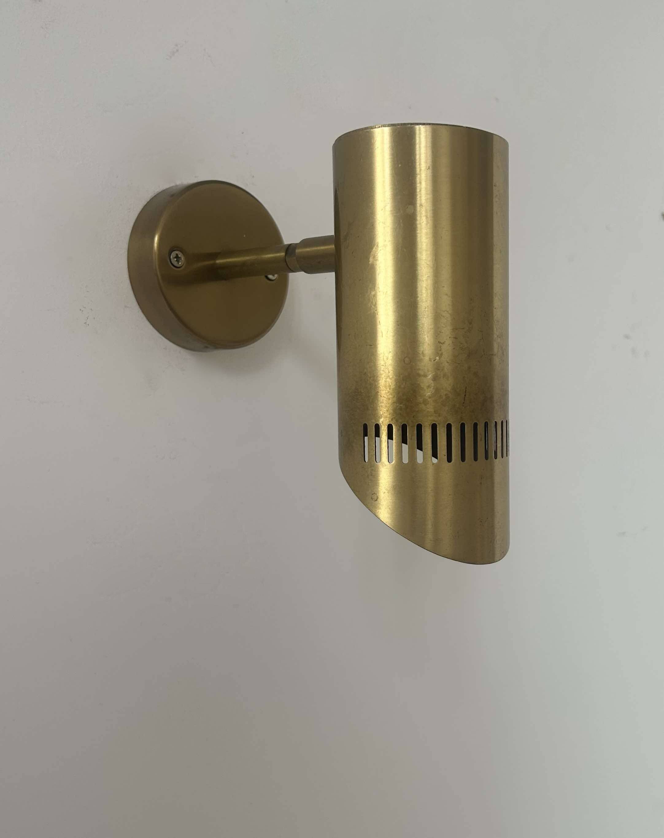 Vintage adjustable wall light, solid perforated brass, France 1960