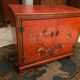 Low sideboard with lacquered decoration with birds on orange background Far East China Japan