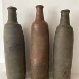 Antique terracotta cider bottles