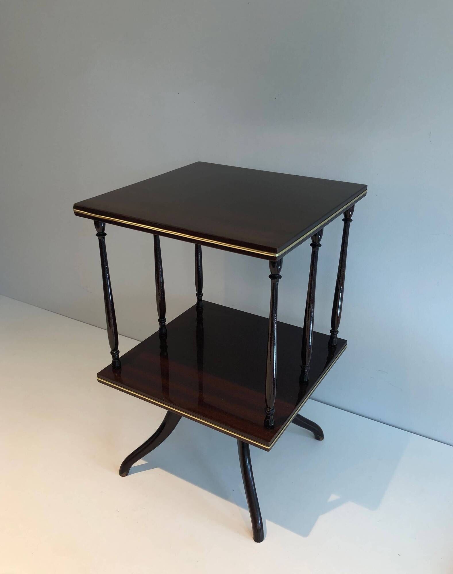 Rotating Table with Two Mahogany and Brass Platforms with Turned Columns.