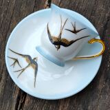 Cup and its saucer in Limoges porcelain motif "swallows"