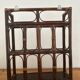Rattan wall shelf