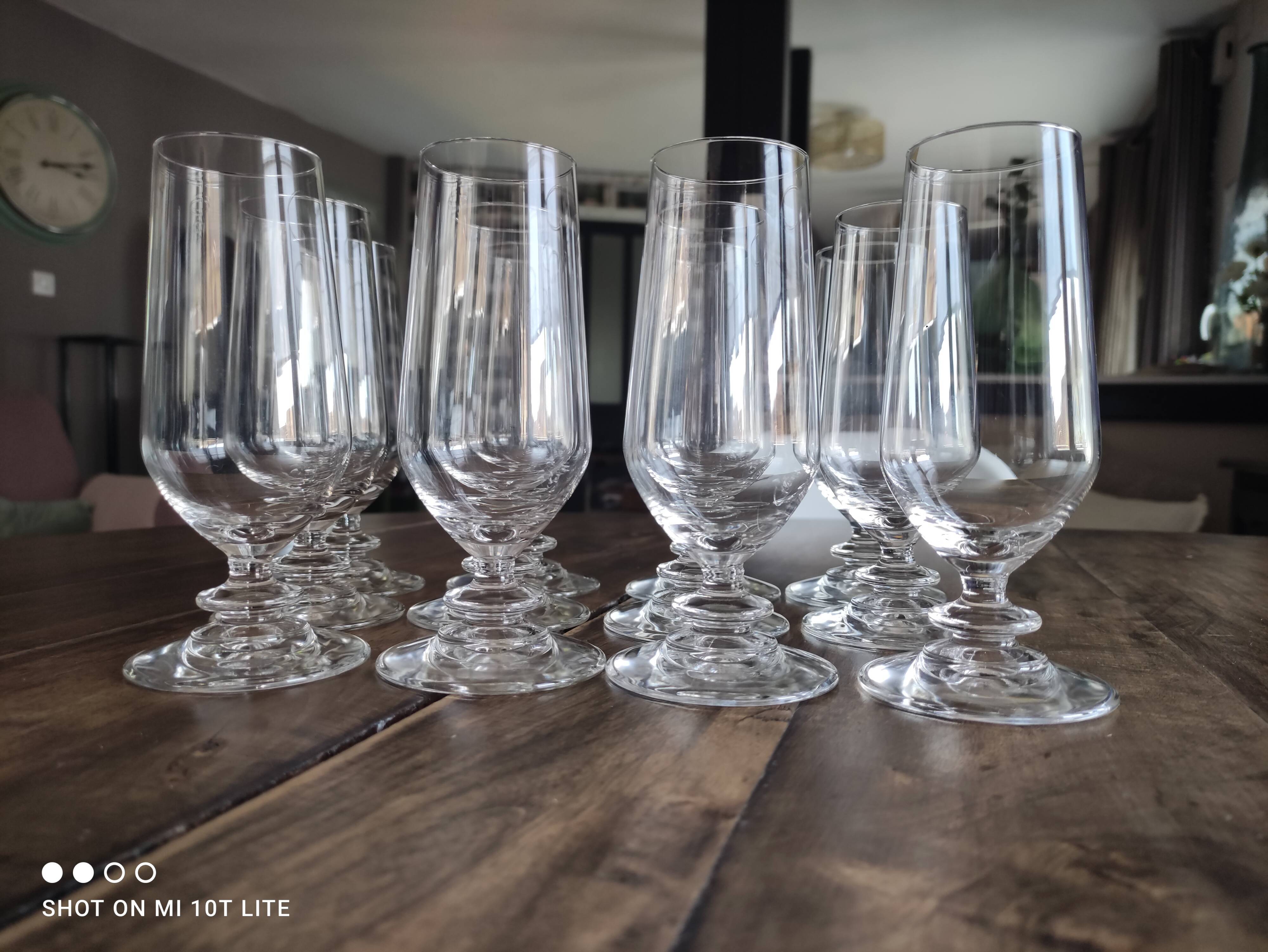 Set of 12 vintage champagne flutes on low crystalline stand