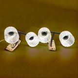 Pair of wall sconces in gilded brass and textured glass