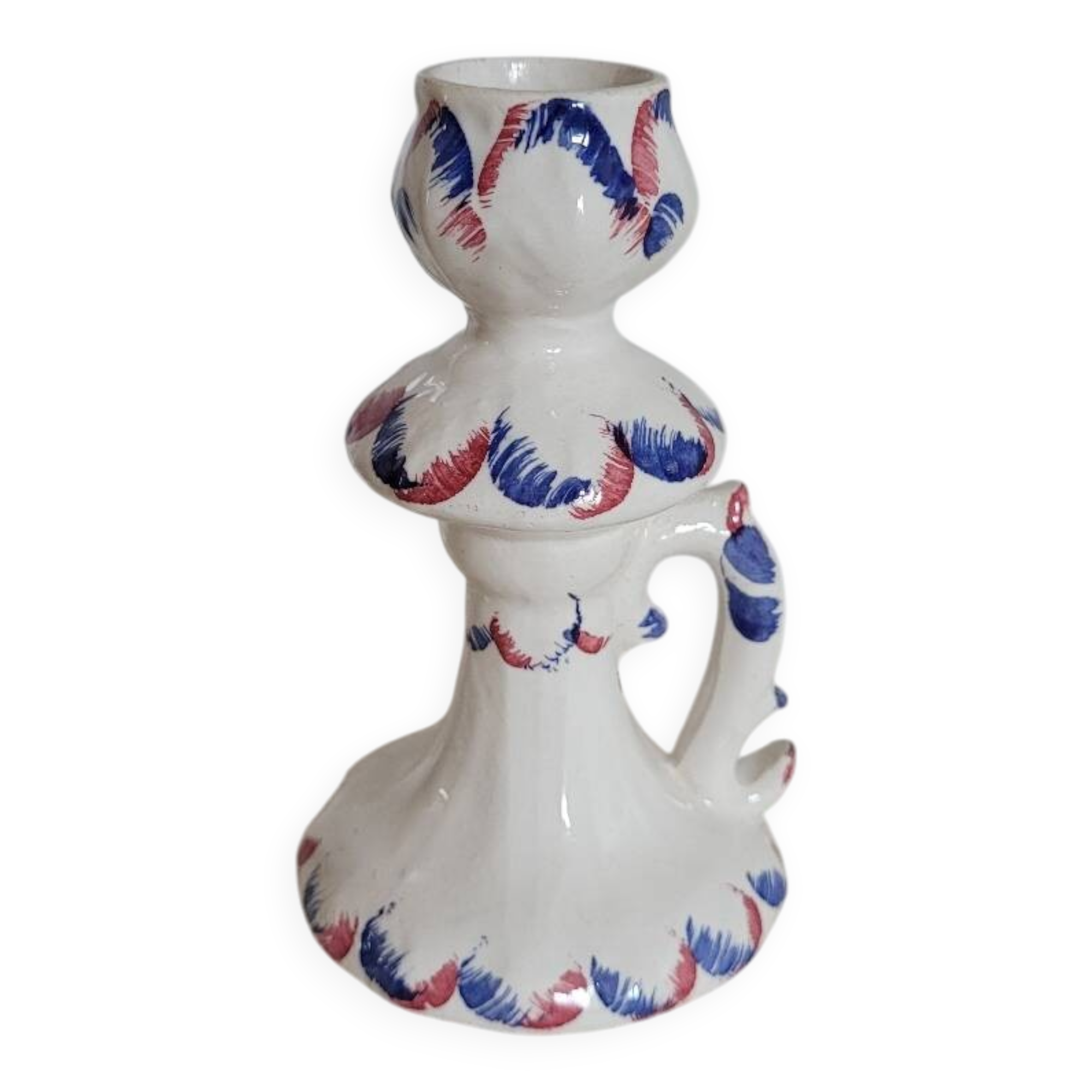 Ceramic candlestick with red and blue decoration.