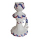 Ceramic candlestick with red and blue decoration.