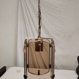 Suspension in gold metal and smoked glass