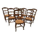 Suite de huit chaises de style Régence en chêne massif XX siècle