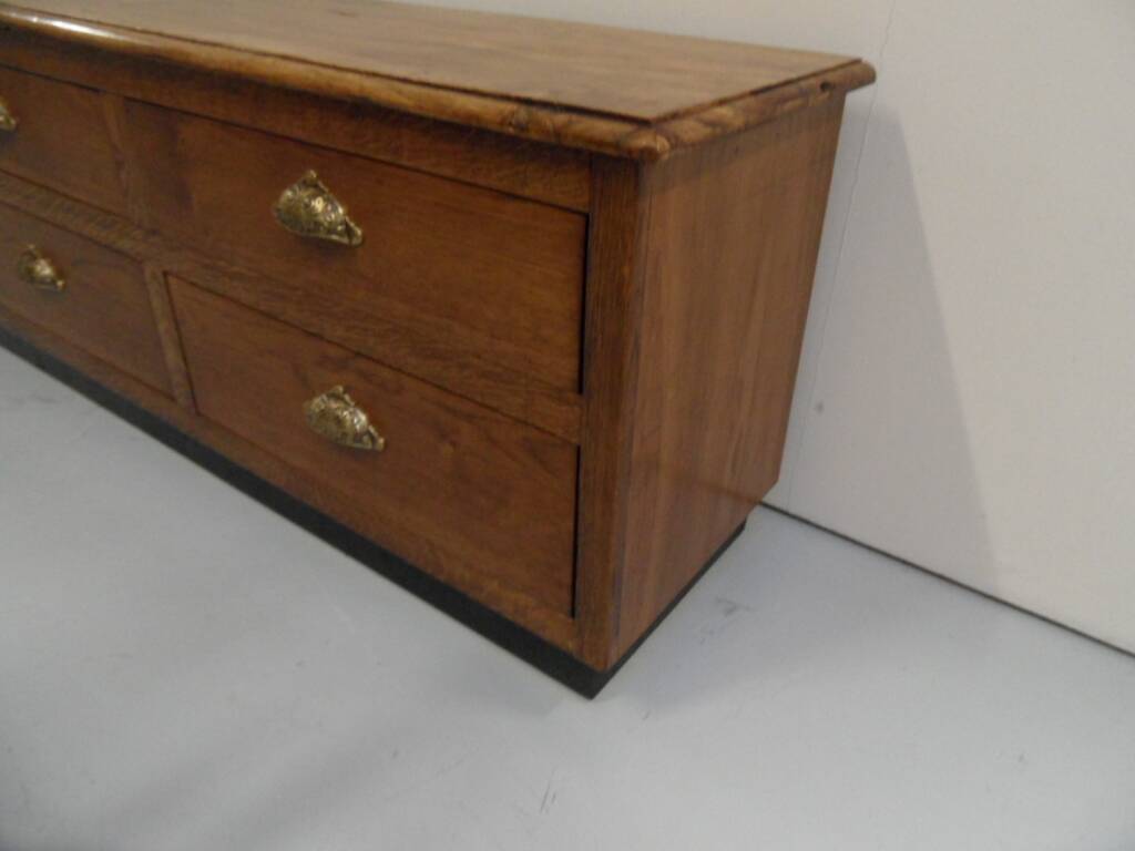 Vintage low TV cabinet from the 1950s with drawers.