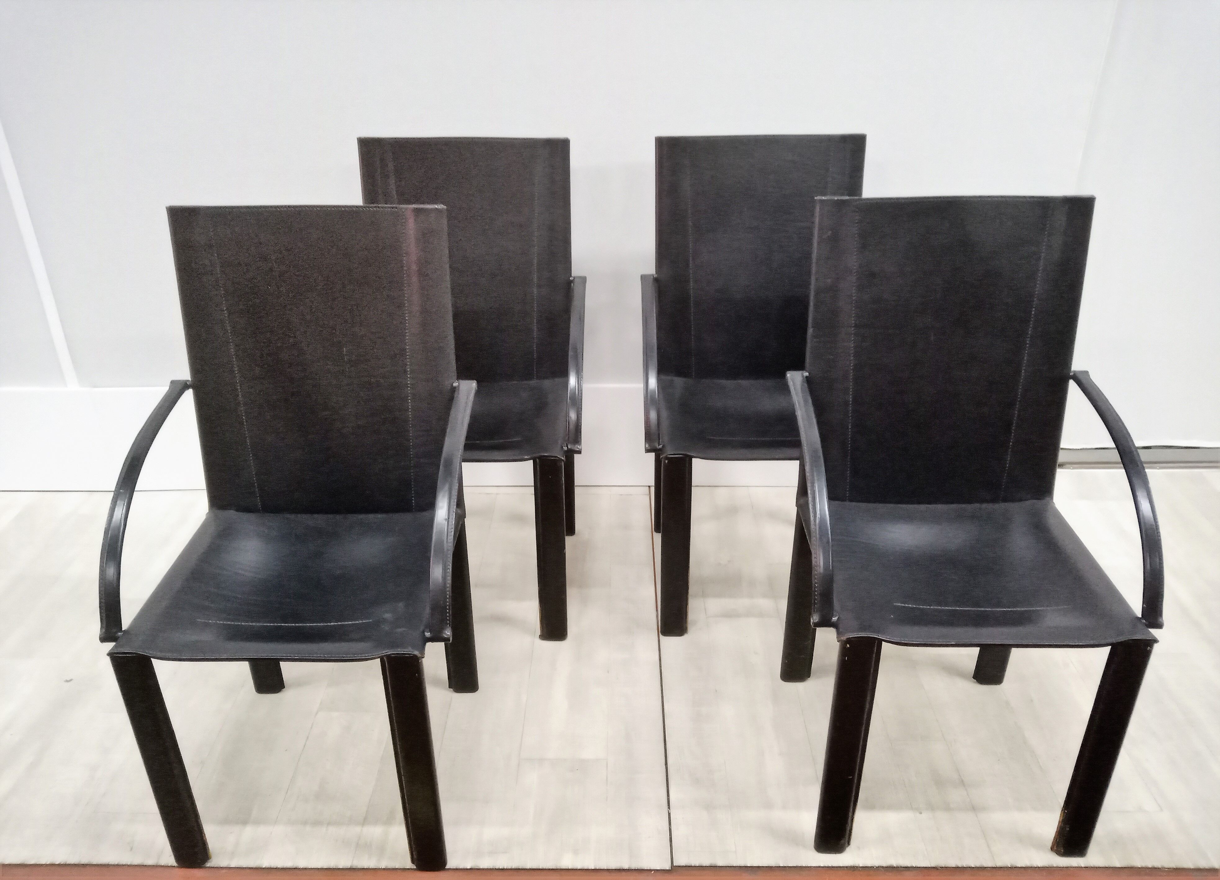 Black leather coral chairs by Matteo Grassi