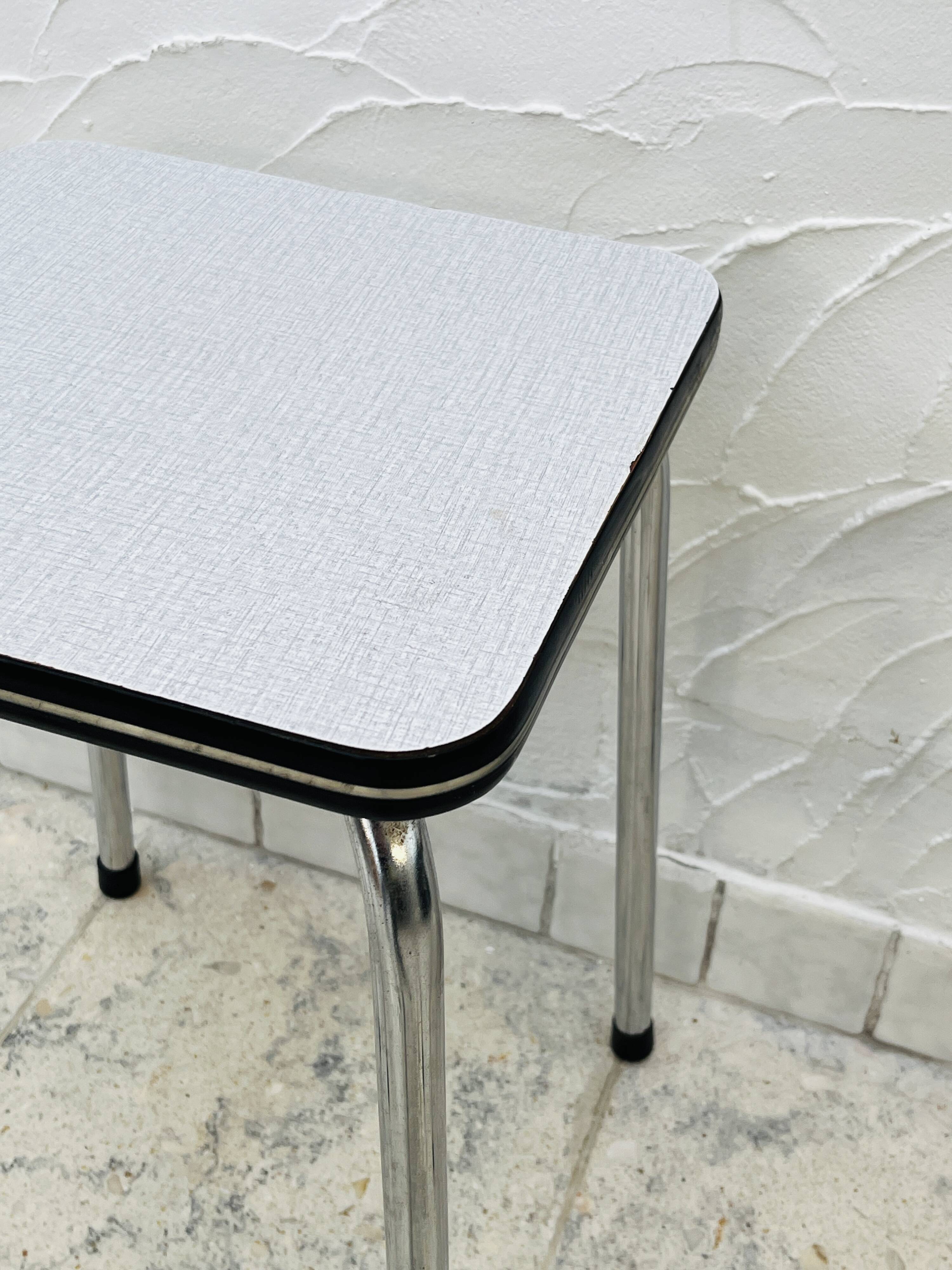 Set of 4 vintage grey chrome Formica stools.