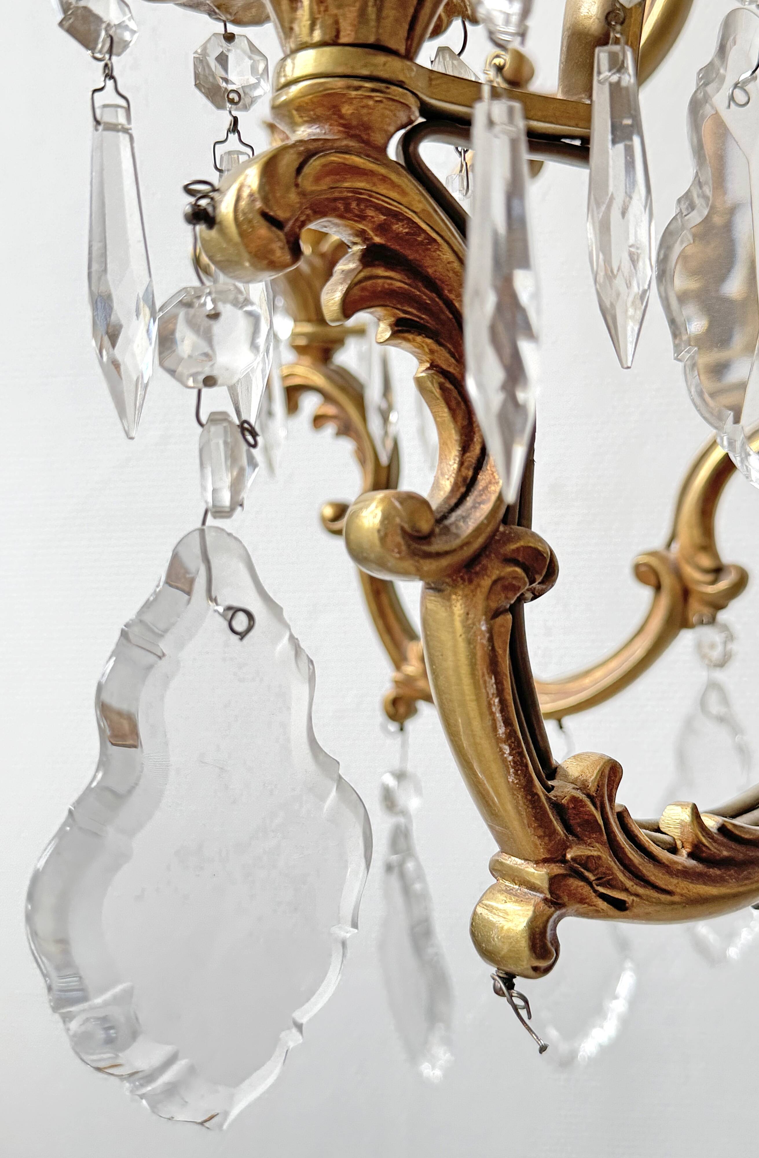 Louis XV style chandelier in gilded bronze with 6 light arms.