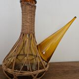 Catalan bottle in amber glass and wicker