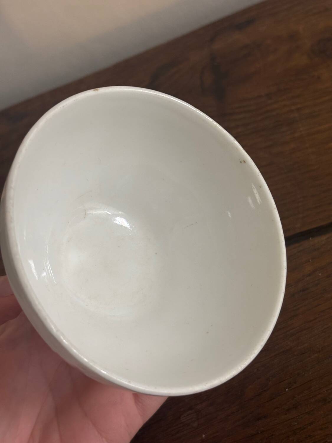 Vintage small antique bowl with floral decoration.