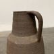 Brutalist German vase on a mid-century stand by Krösselbach Keramik, 1960s.