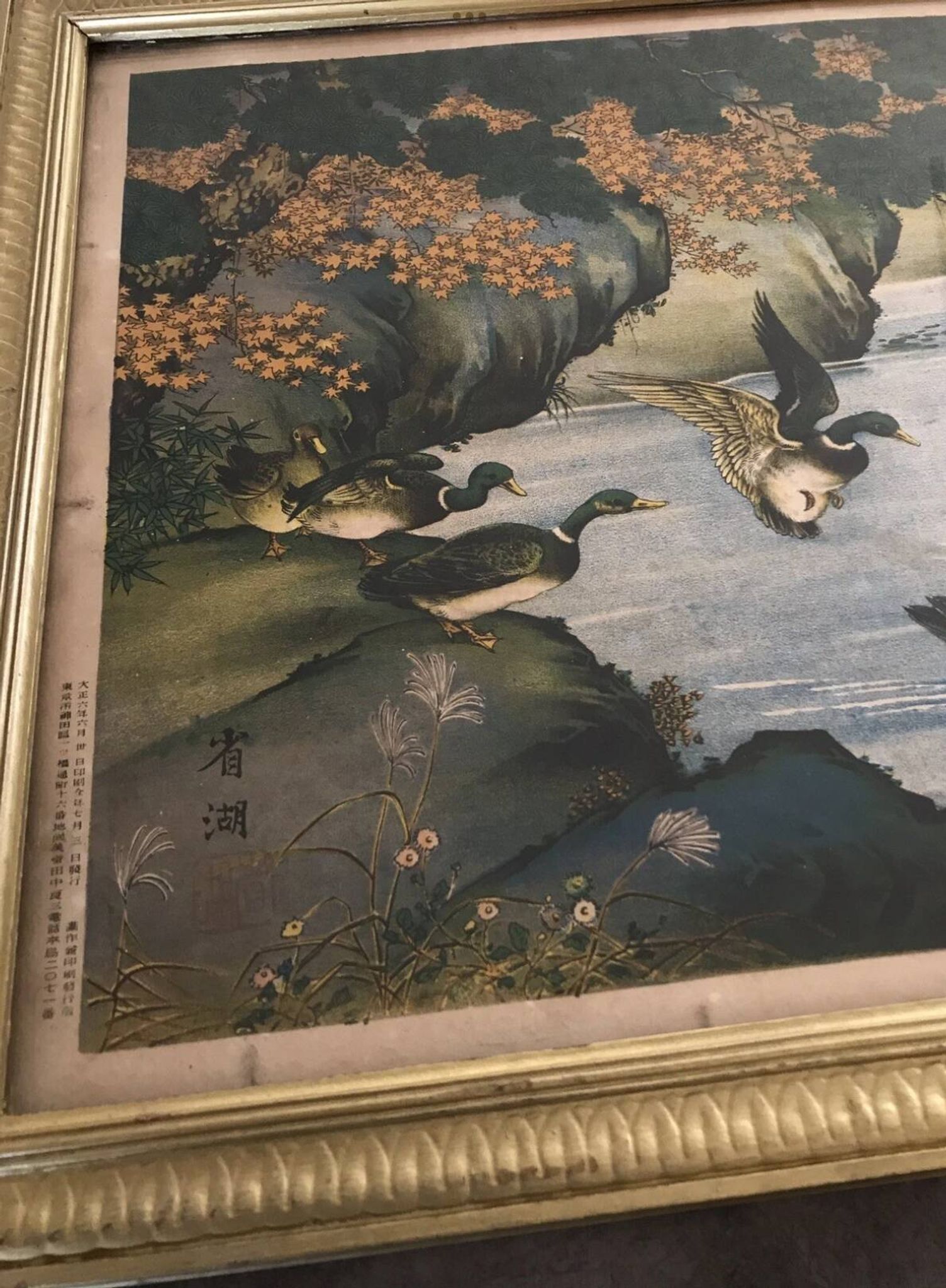 Old painting with a polychrome print decoration of ducks in nature.