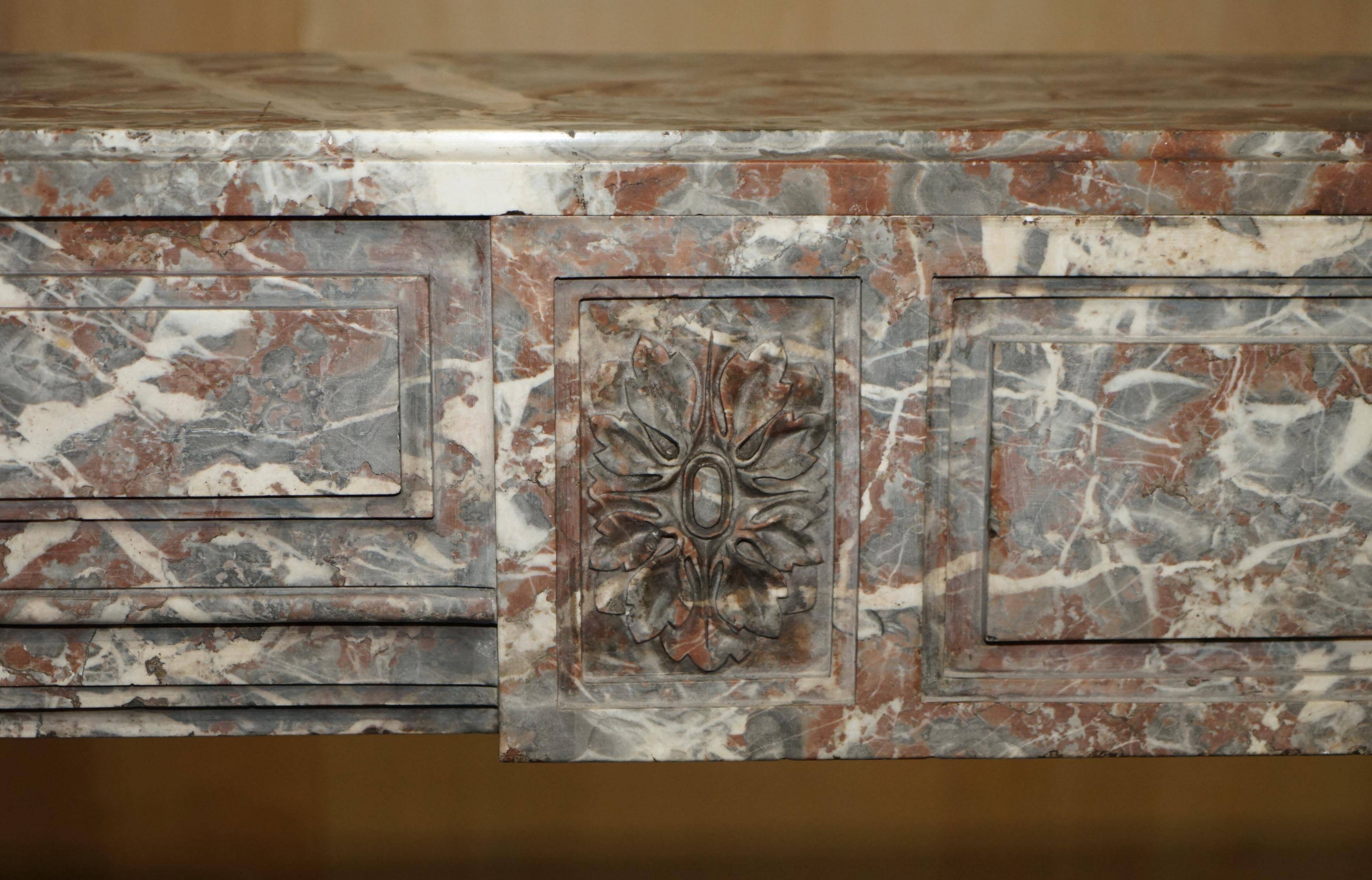 Antique marble fireplace in Saint Remy, Louis XVI style.