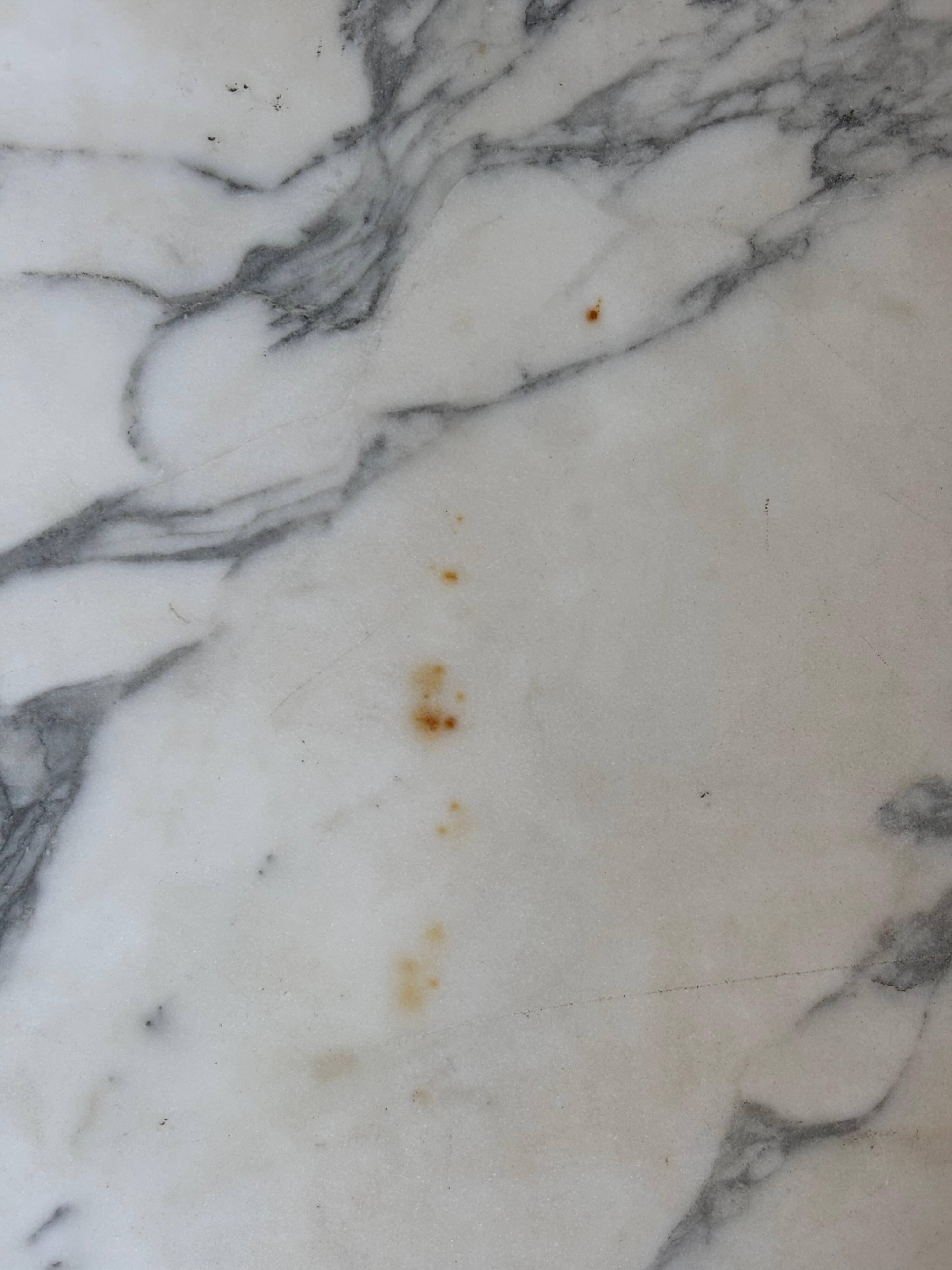 Oval table in white marble