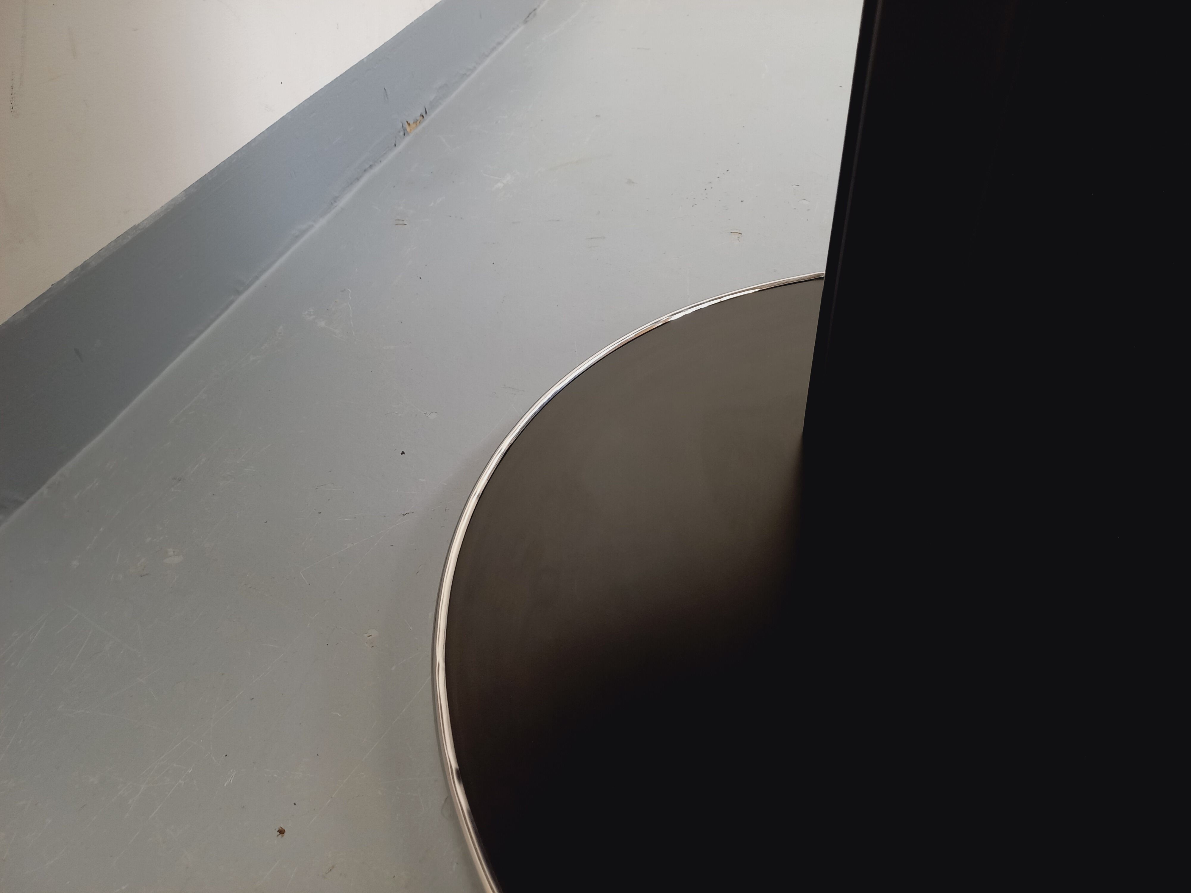 Vintage dining table in melamine with a black wood effect and chrome metal.