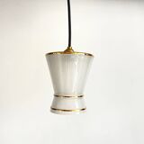 Small white and gold diabolo pendant.