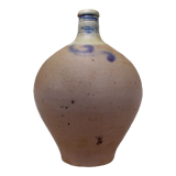Old potiche jug in sandstone of Alsace