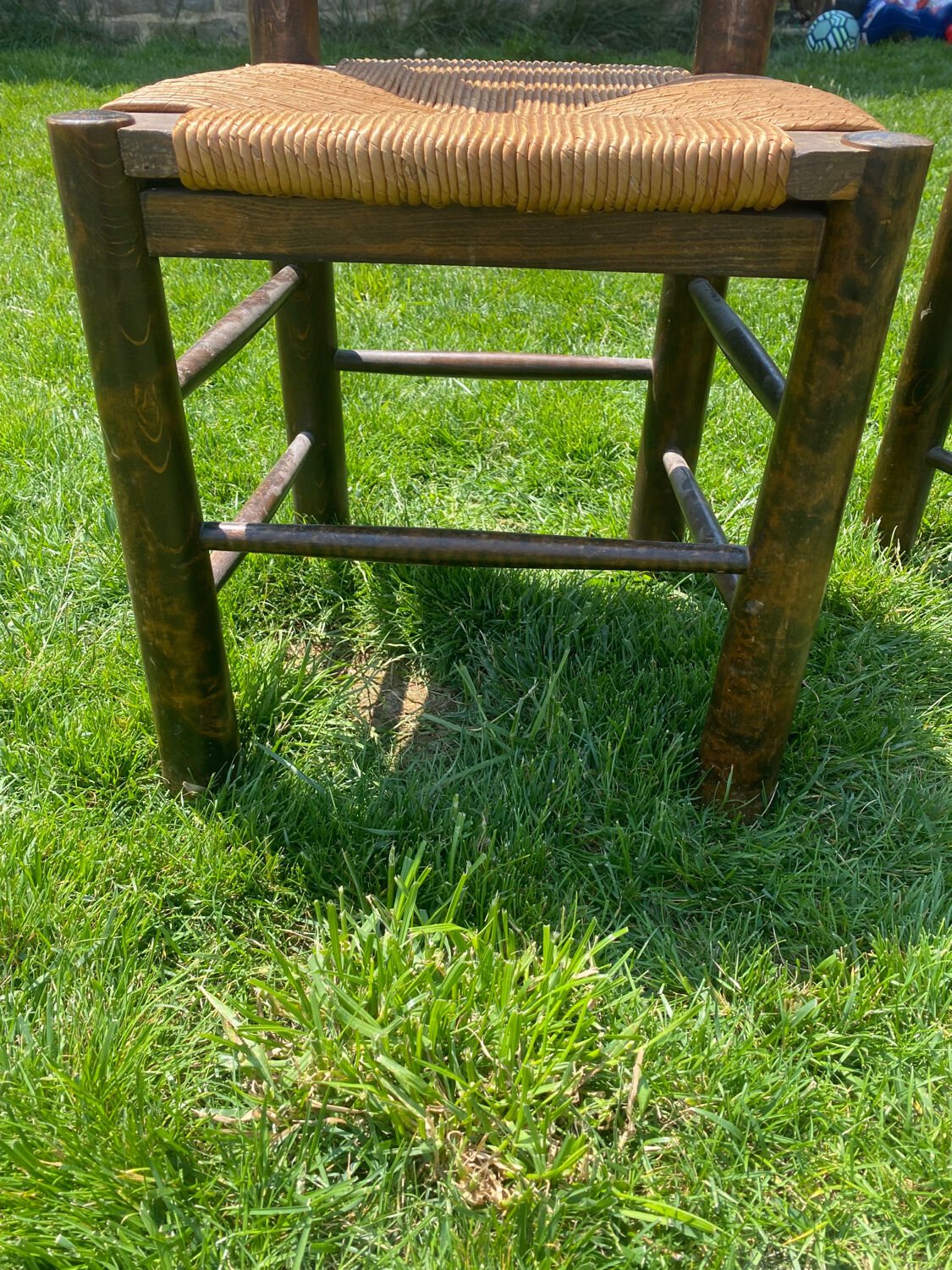 Pair of Georges Robert straw chairs