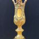 Pair of antique carved bronze candlesticks.