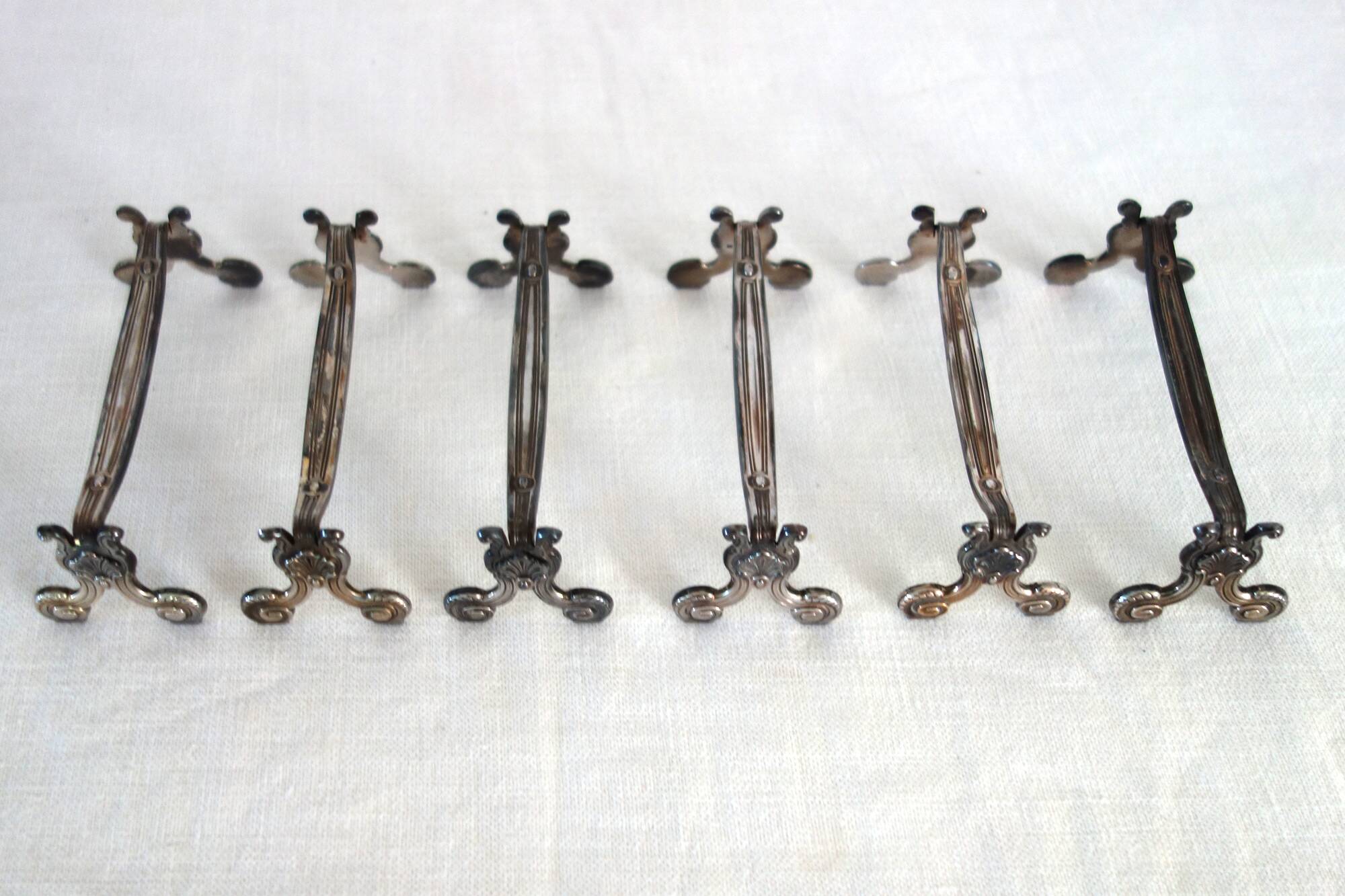 6 porte-couteaux en métal argenté Christofle
