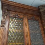 Glass-fronted walnut bookcase