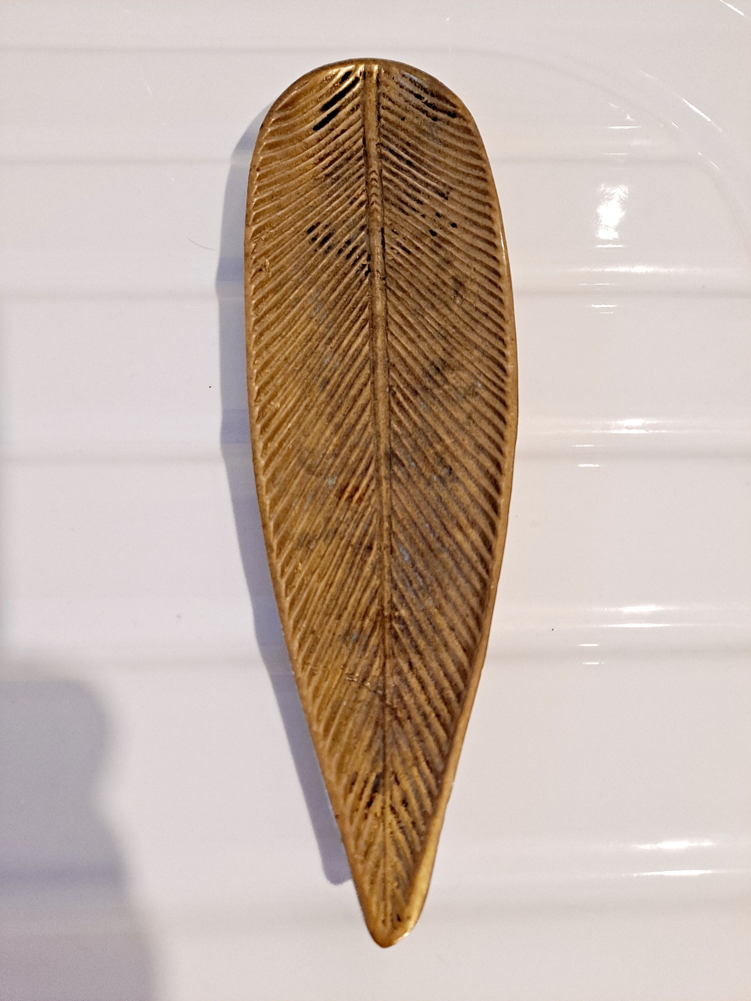 Empty brass leaf pocket