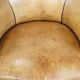 Antique sheep leather club chair/armchair on wheels