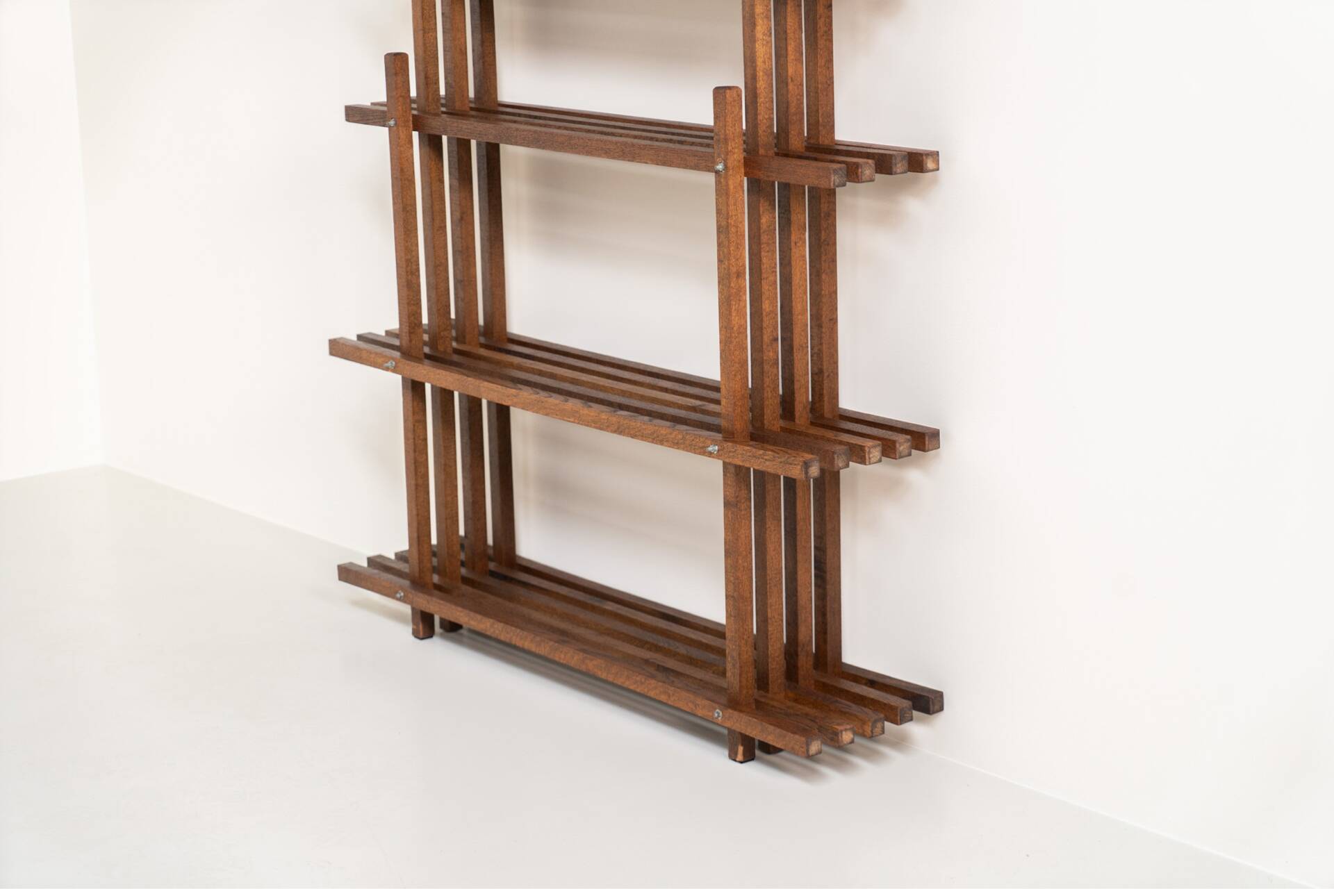Sculptural wengé slat bookcase (Europe, 1960s).