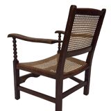 Fauteuil Art Déco en chêne tressé, design minimaliste.