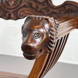 Vintage carved wooden folding armchair