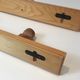 Charlotte Perriand, pair of fir wall coat racks, French work, around 1970