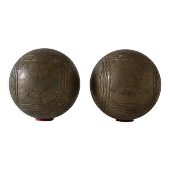 Paire d'anciennes boules de petanque